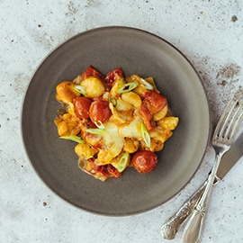 Mijoté de gnocchi, tomates et poivrons grillés